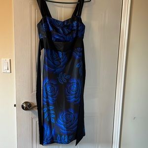 Satin strapped mid length dress. Floral. Size small. Gently used